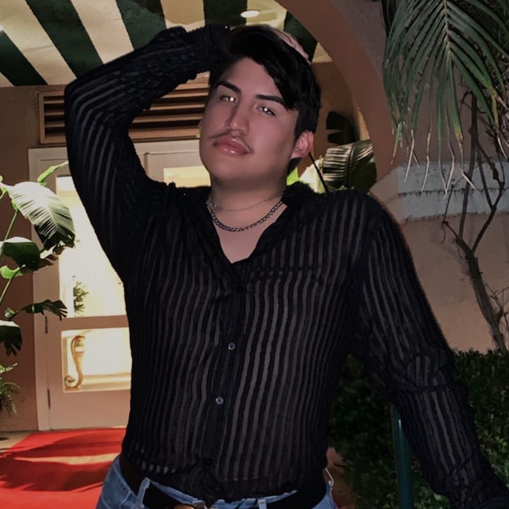 Men’s mesh button up.